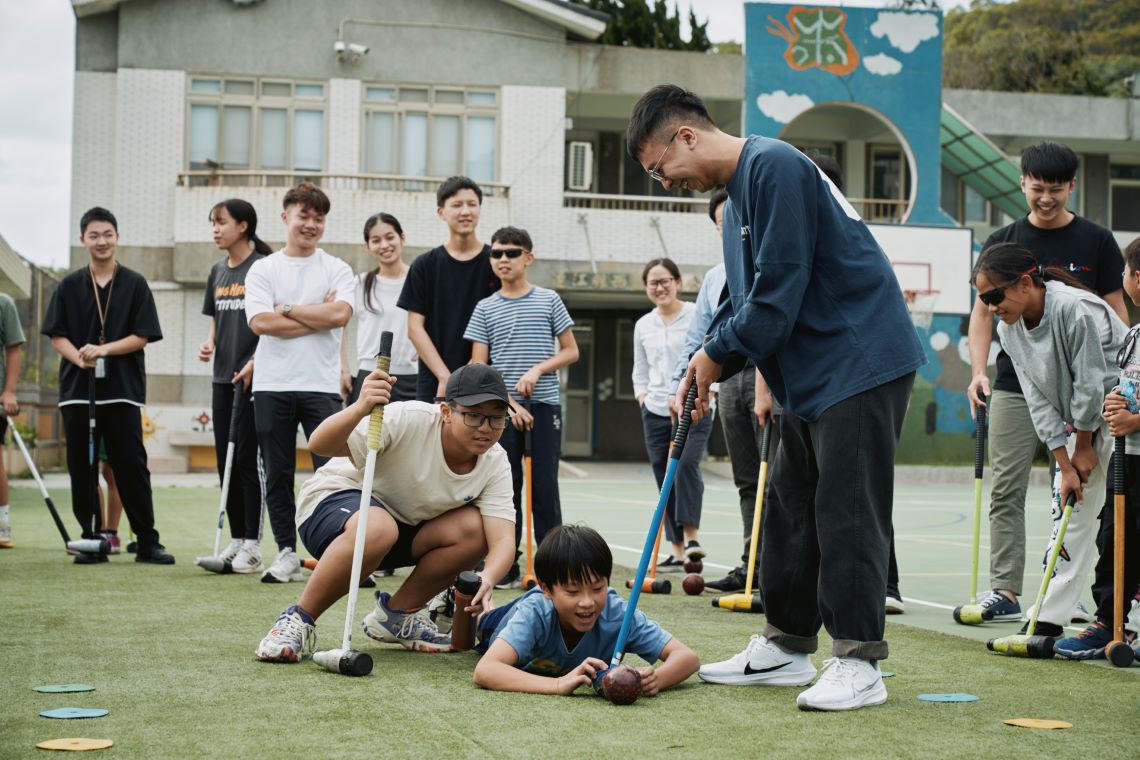 A group photo with NSO and children